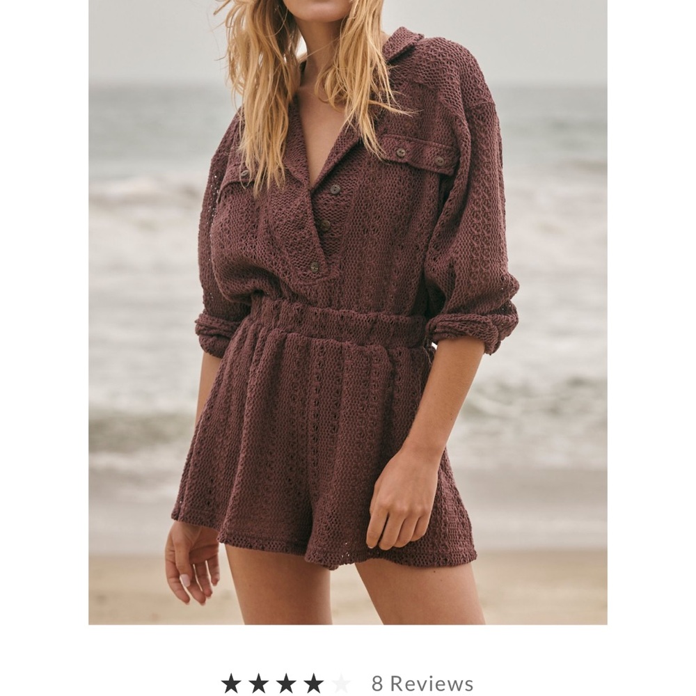 Beautiful beach romper. Never worn. Great for summer!